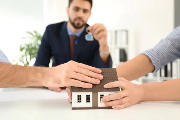 Couple arguing over property in divorce mediation Bolton